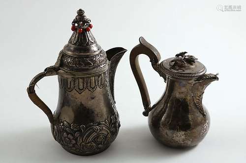 An early 19th century small french hot milk jug