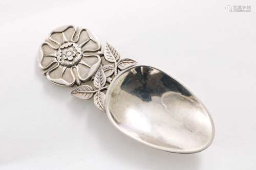 A contemporary scottish caddy spoon