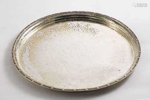 An early 20th century circular tray