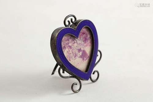 A late victorian miniature heart-shaped photograph frame