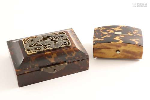 A small late 19th century tortoiseshell-covered boxon ball feet with a