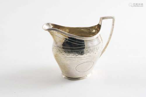 A george iii small engraved cream jug