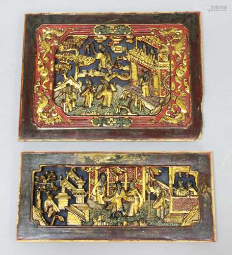 Two chinese carved, gilt and lacquered panels,19th century, each carved with
