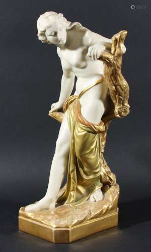 The bather surprised,a royal worcester figure after sir thomas brock, model