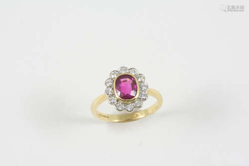 A ruby and diamond cluster ring