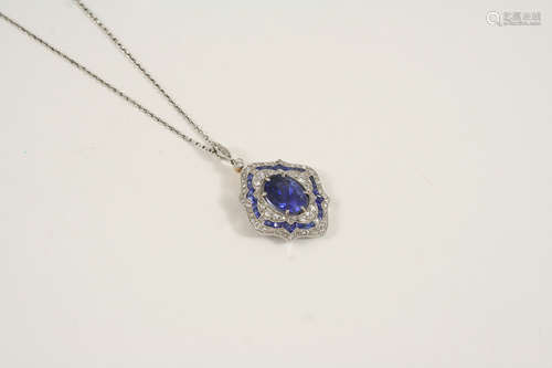 An edwardian sapphire and diamond pendant