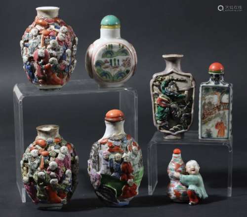 Collection of seven chinese porcelain snuff bottles,including two moulded with