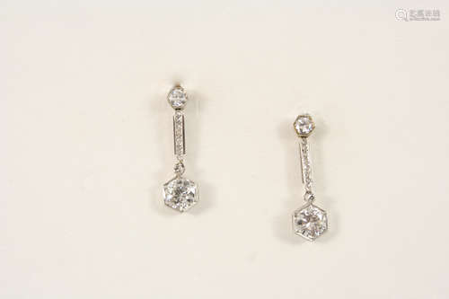 A pair of diamond drop earrings