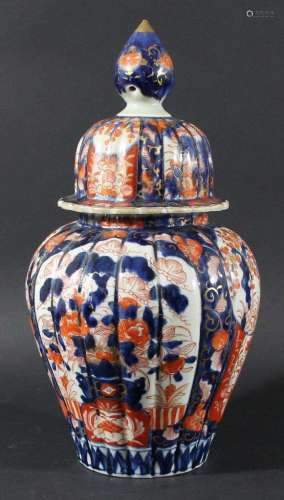 Japanese imari vase and cover,19th century, of reeded ovoid form, with panels
