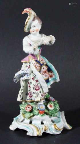 Bow figure of a young lady,circa 1780, standing holding her arm outstretched,