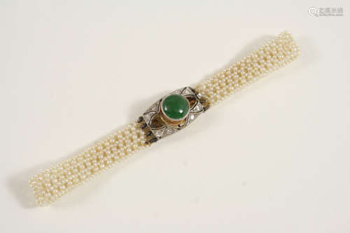 An early 20th century jade, diamond and seed pearl bracelet