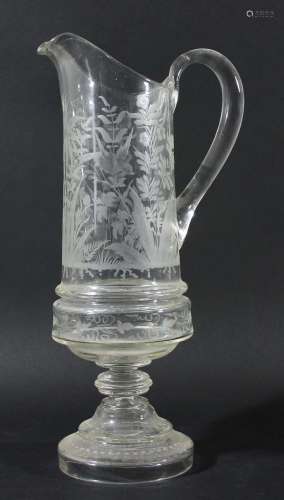 French glass water jug,late 19th century, of tapering form on a knopped stem