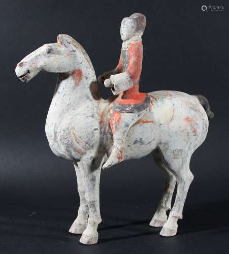 Chinese pottery horse and rider,probably han dynasty, the horse standing four