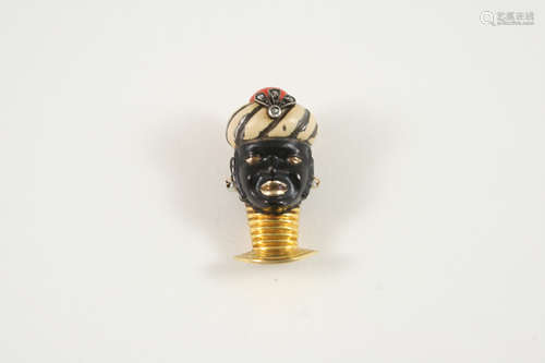 A enamel and diamond blackamoor brooch by cartier