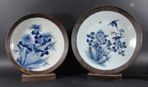 Two chinese blue and white chargers,painted with birds in flowering foliage