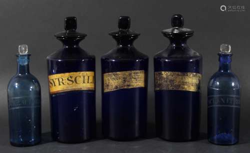 Set of seven 'bristol' blue glass apothecary jars and stoppers,