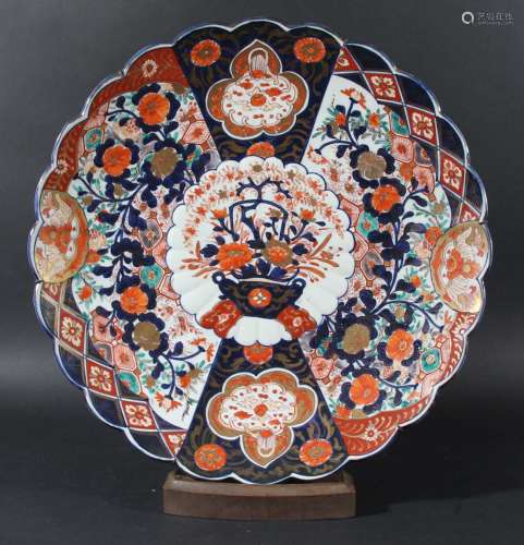 Japanese large imari charger,19th century, of scalloped form, painted with a