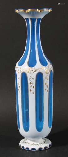 Bohemian glass vase,white cut through to blue, with flowerhead mouth, gilt