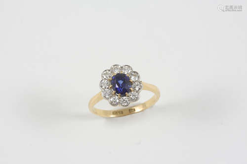 A sapphire and diamond cluster ring