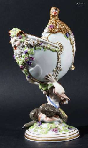 Meissen style bacchanalian cup,modelled as a nautilus shell with satyr and