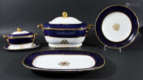 Coaplort blue and gilt part dinner service,with gilt fruit finials and stylised