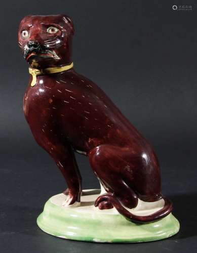 Staffordshire figure of a seated dog,mid 19th century, facing sinister, with a