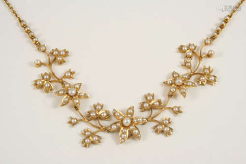 A victorian gold and pearl set necklace