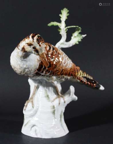 Meissen figure of a woodcock,20th century, perched on a branch, blue crossed