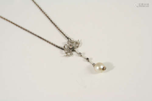An edwardian diamond and pearl pendant