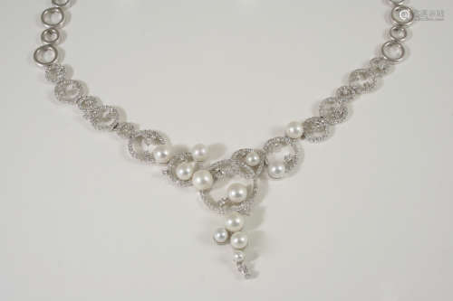 A diamond and cultured pearl necklace