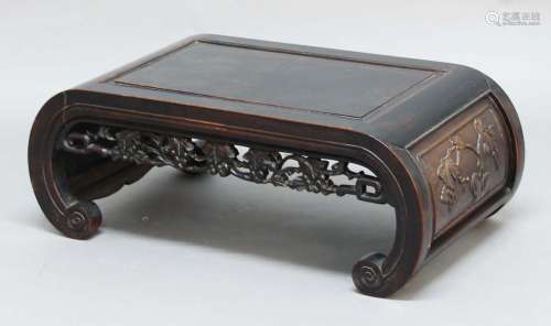 Chinese export hardwood low table,with scrolling supports and pierced, fruiting