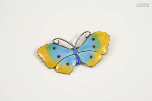 An enamel and silver butterfly brooch