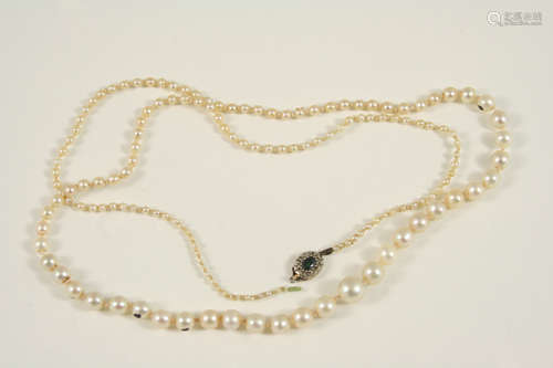 A single row graduated natural pearl necklace