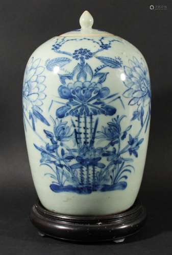 Chinese celadon vase and cover,of ovoid form, blue painted with lotus and other