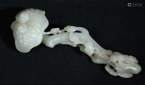 A HETIAN WHITE JADE CARVED GANODERMA SHAPED RUYI