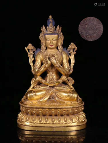 A GILT BRONZE MULTI-ARMS GUANYIN BUDDHA