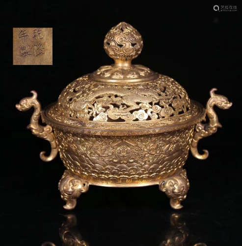 A GILT BRONZE HOLLOW PATTERN CENSER WITH COVER