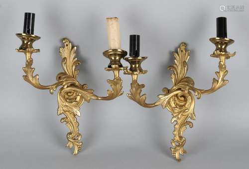 Two gold-plated brass wall lamps in Rococo style. 20th