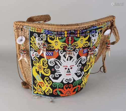 South American wicker children's carrying bag with