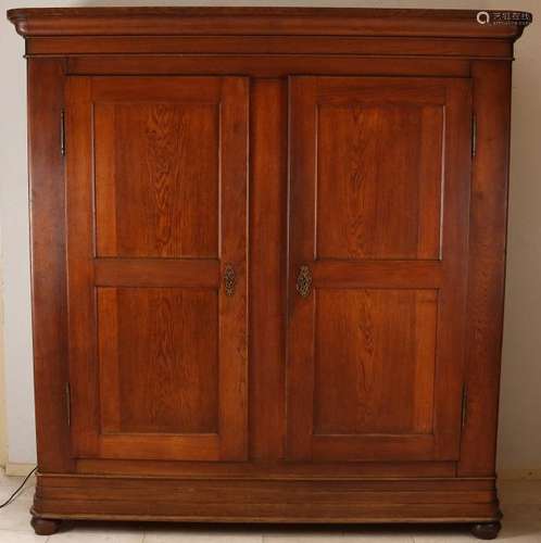 Antique German oak Biedermeier farmer's cupboard. Circa