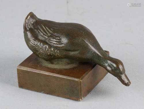 Antique bronze duck on bronze base. Size: 4.5 x 7.5 x 5