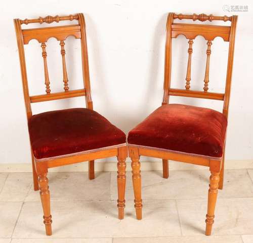 Four antique German walnut Gründerzeit chairs.