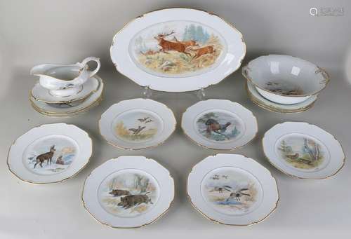 Fifteen-piece German porcelain game with various wild /