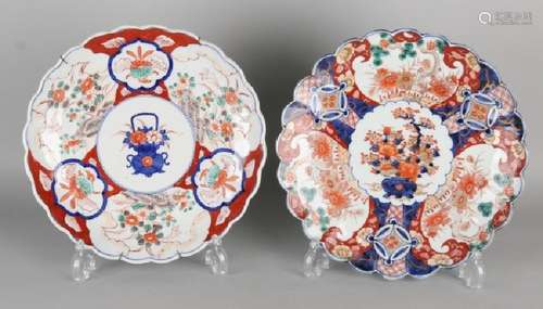 Two large 19th century Imari porcelain printed plates.