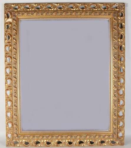 Gold colored openwork facet cut mirror. Late 20th