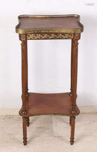 19th Century French walnut piedestal table with brass