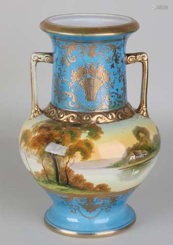 Antique hand-painted porcelain vase with landscapes and