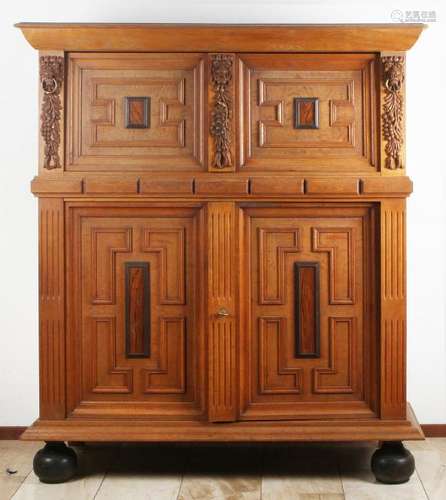 Zeeland cupboard with ball legs and panels veneered