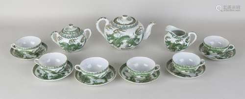 Six-piece Japanese eggshell tea set with dragon decor.