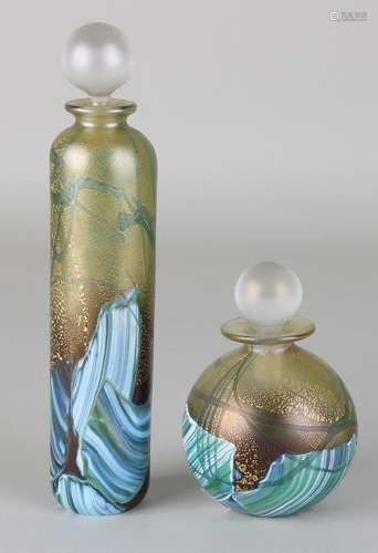 Two design perfume bottles in aqua tones with gold from